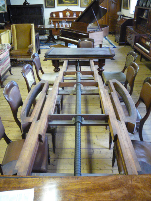 Victorian engineering at its best. The mechanism of an extending dining table offered at Hartleys in West Yorkshire. Image courtesy of Hartleys.